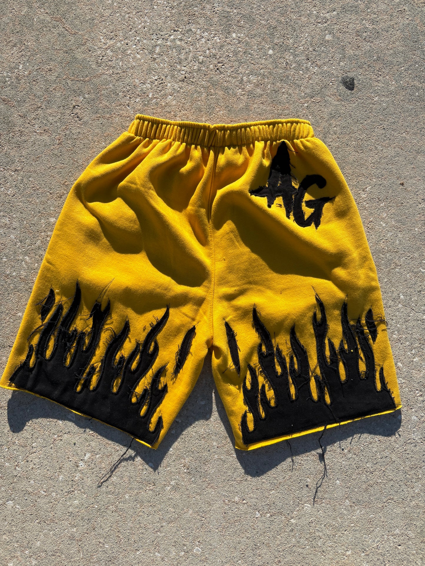 Yellow and black AG shorts